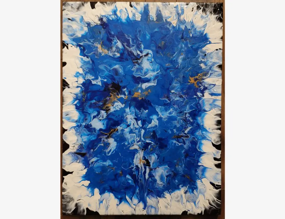 Abstract painting with swirling shades of blue, white, and hints of gold; the colors blend and spread outward from the center.