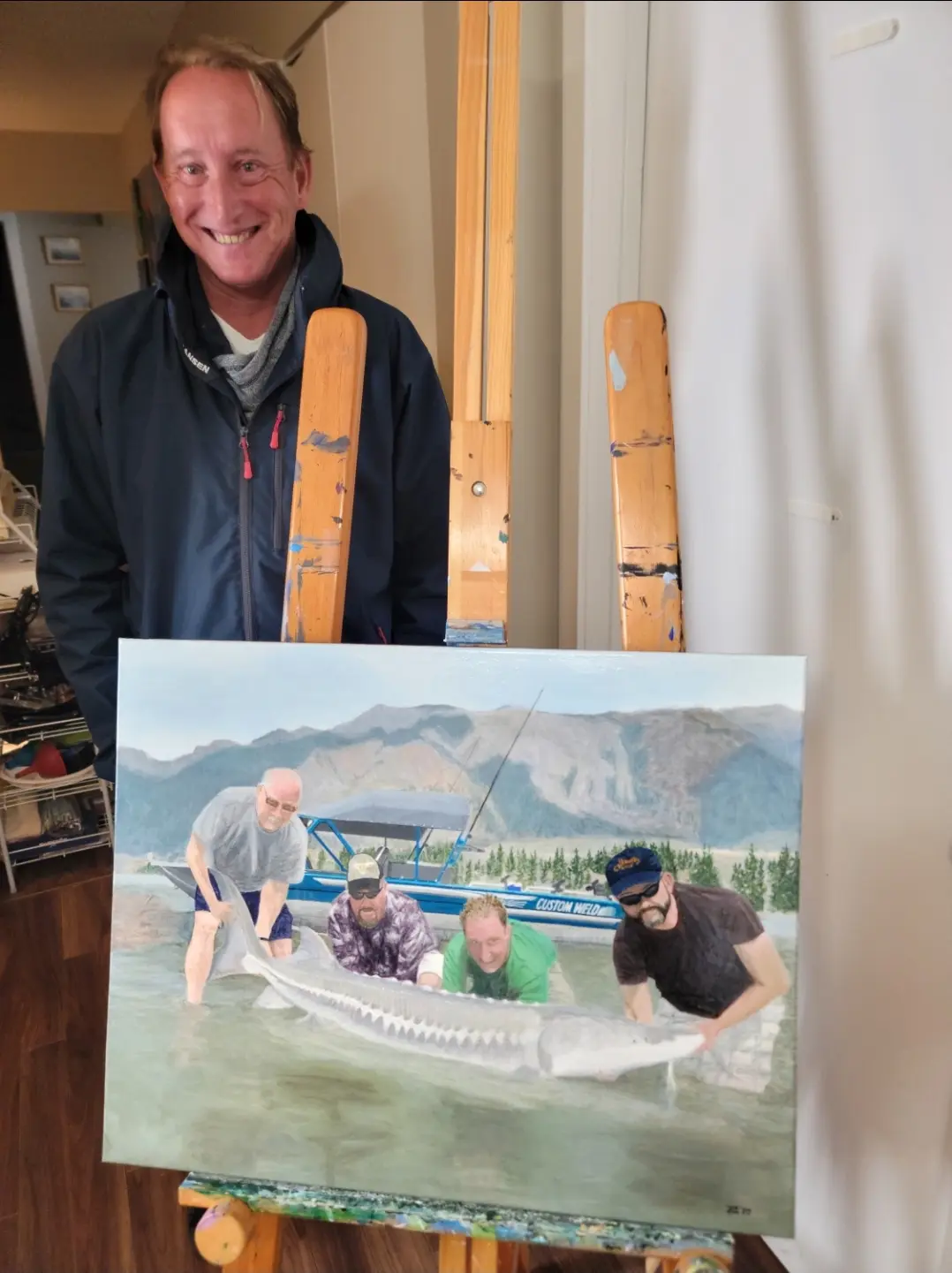 Client with his painting Client with his painting